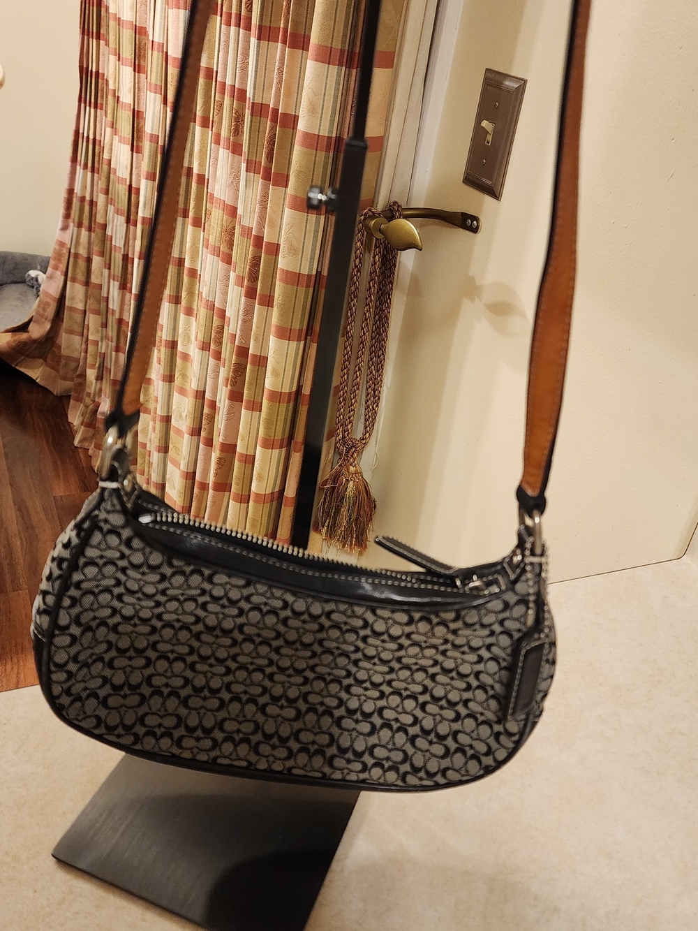 1993 Coach Signature Sufflette cloth featuring the signature Mini "C" jacquard
